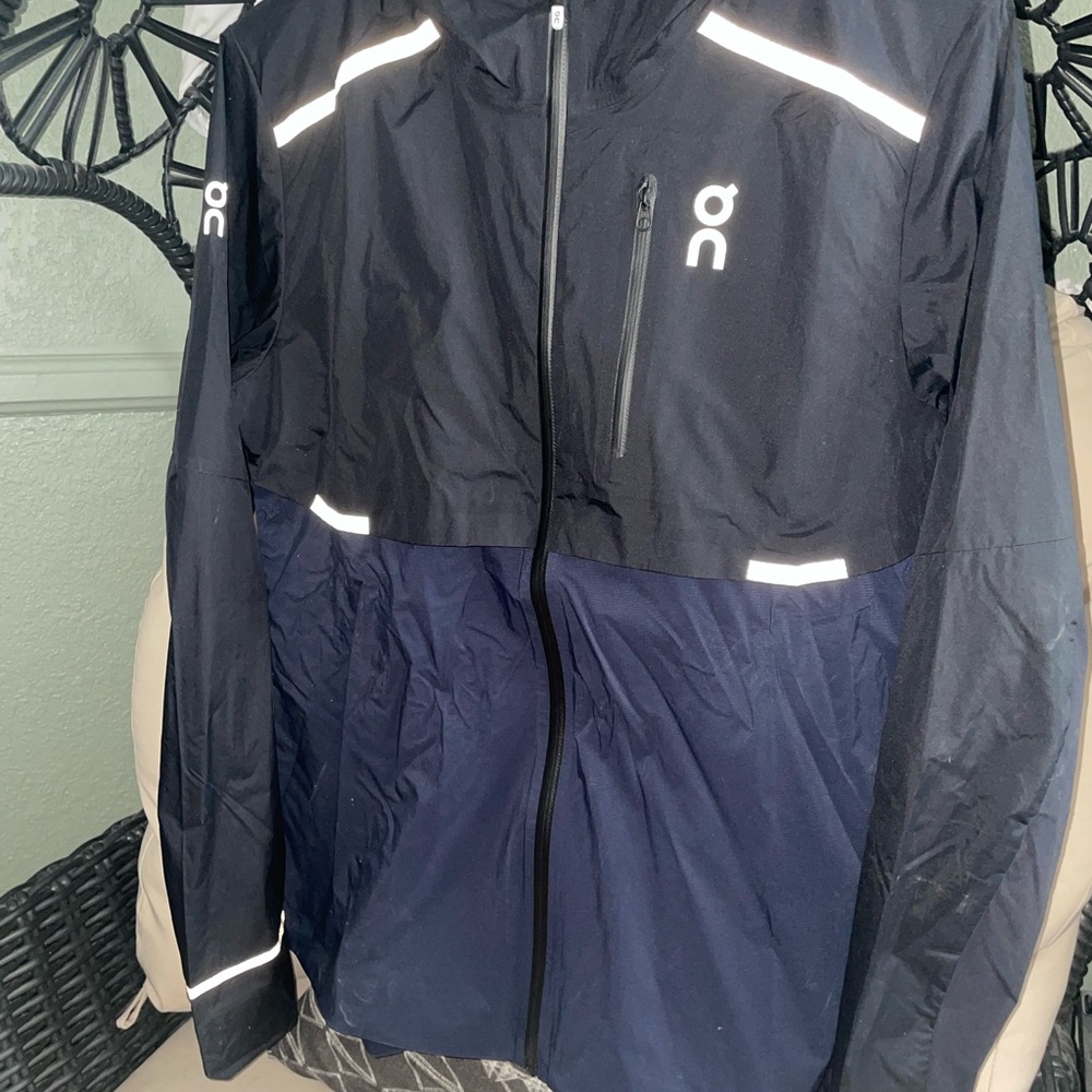 On Running Black and Blue Performance Jacket with Reflective Elements